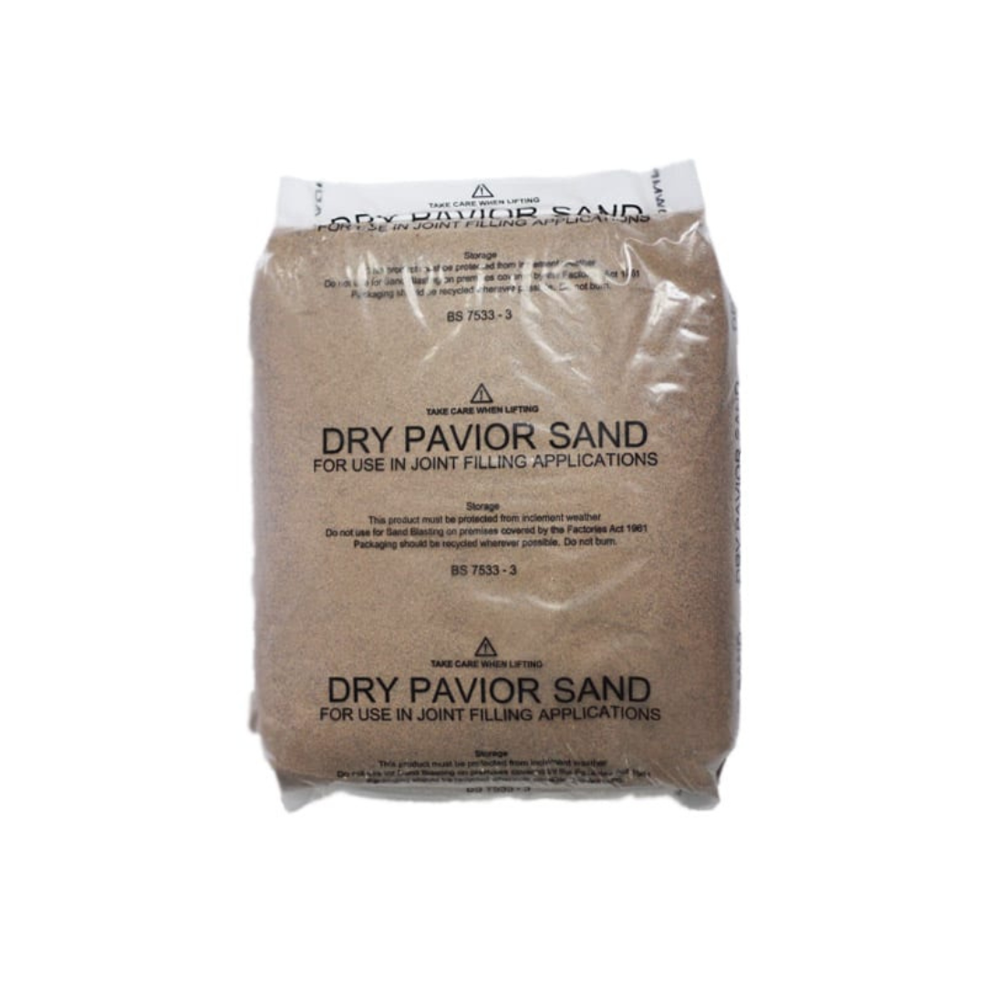 A sealed 25kg bag of dry pavior sand for joint filling applications, with warning labels and storage instructions visible.